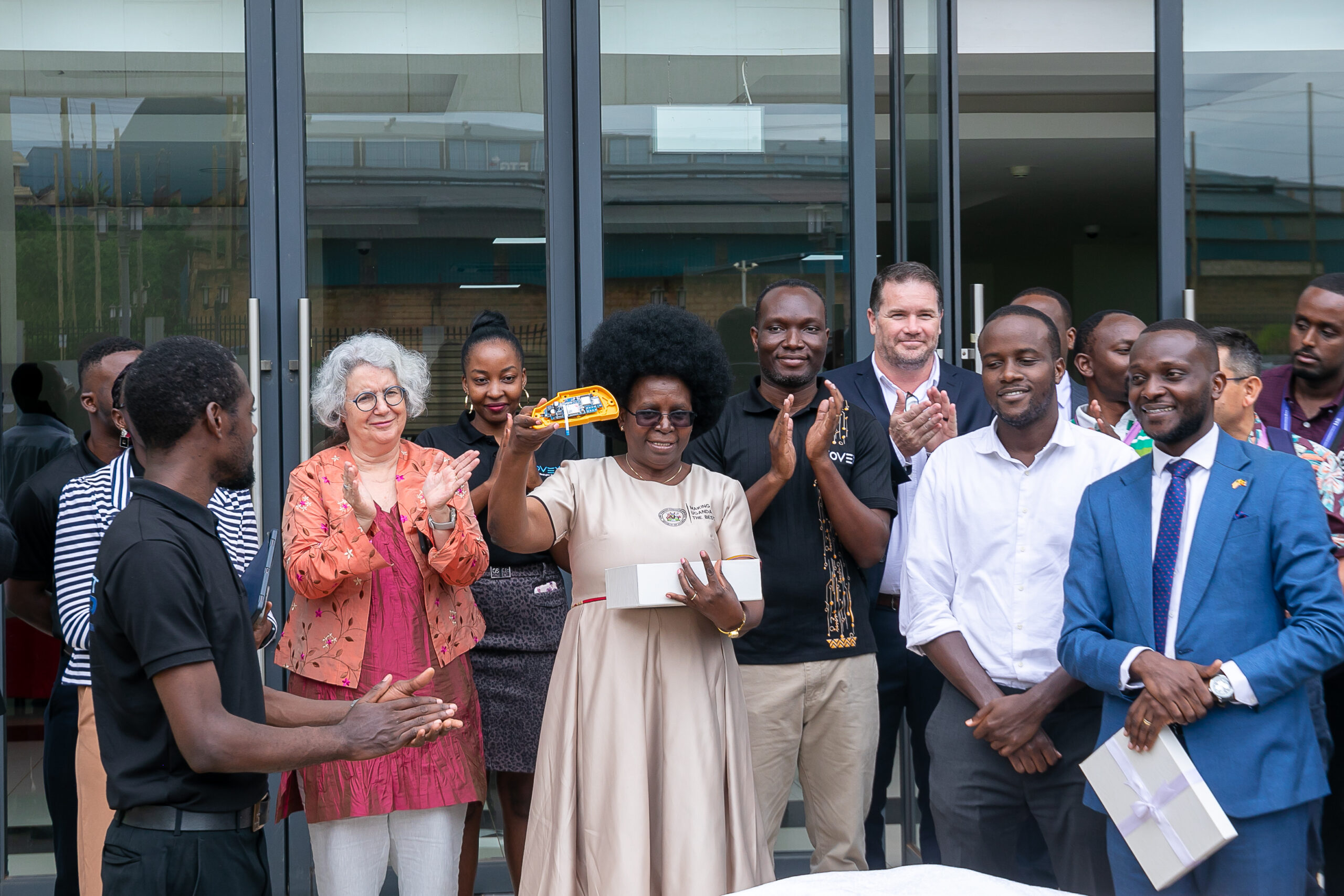 ENNOS and Innovex teams next to a solar-powered water pump installation